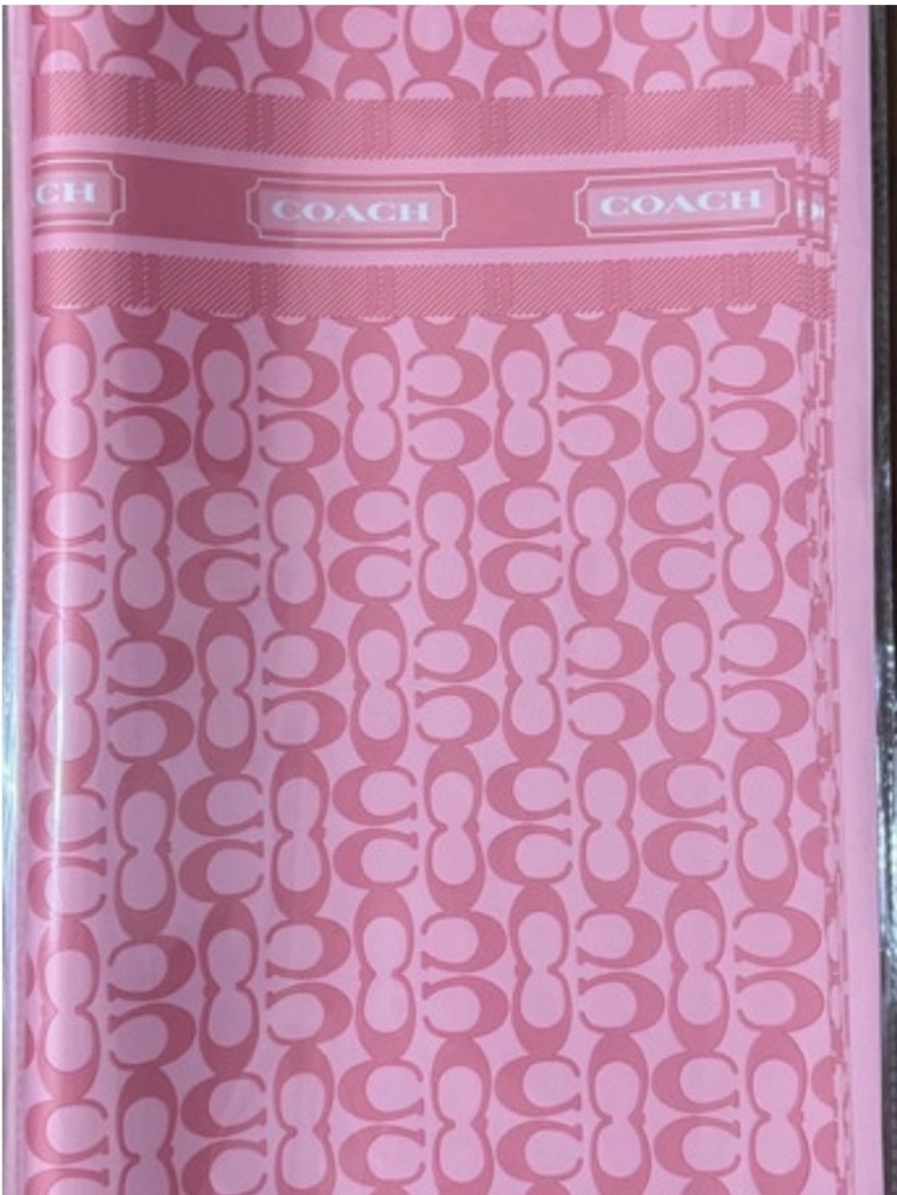 Coach Pink Signature Monogram wrapped paper